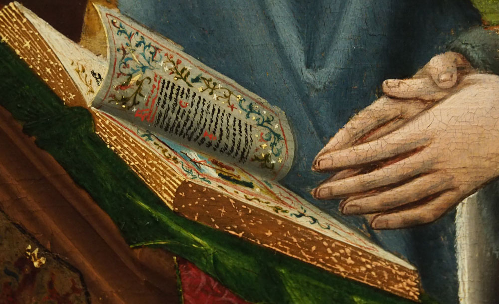 Livre ouvert sur une scène de crucifixion enluminée avec un peu de texte visible également. Le tout est très coloré.